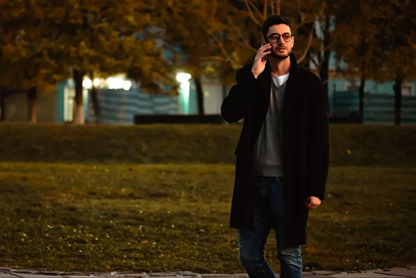  A person calling local emergency services immediately. 