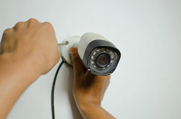 Setting up a CCTV camera.